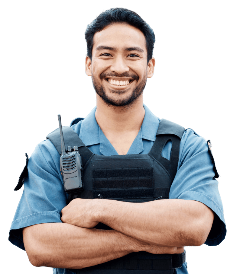 Smiling security guard with arms crossed.