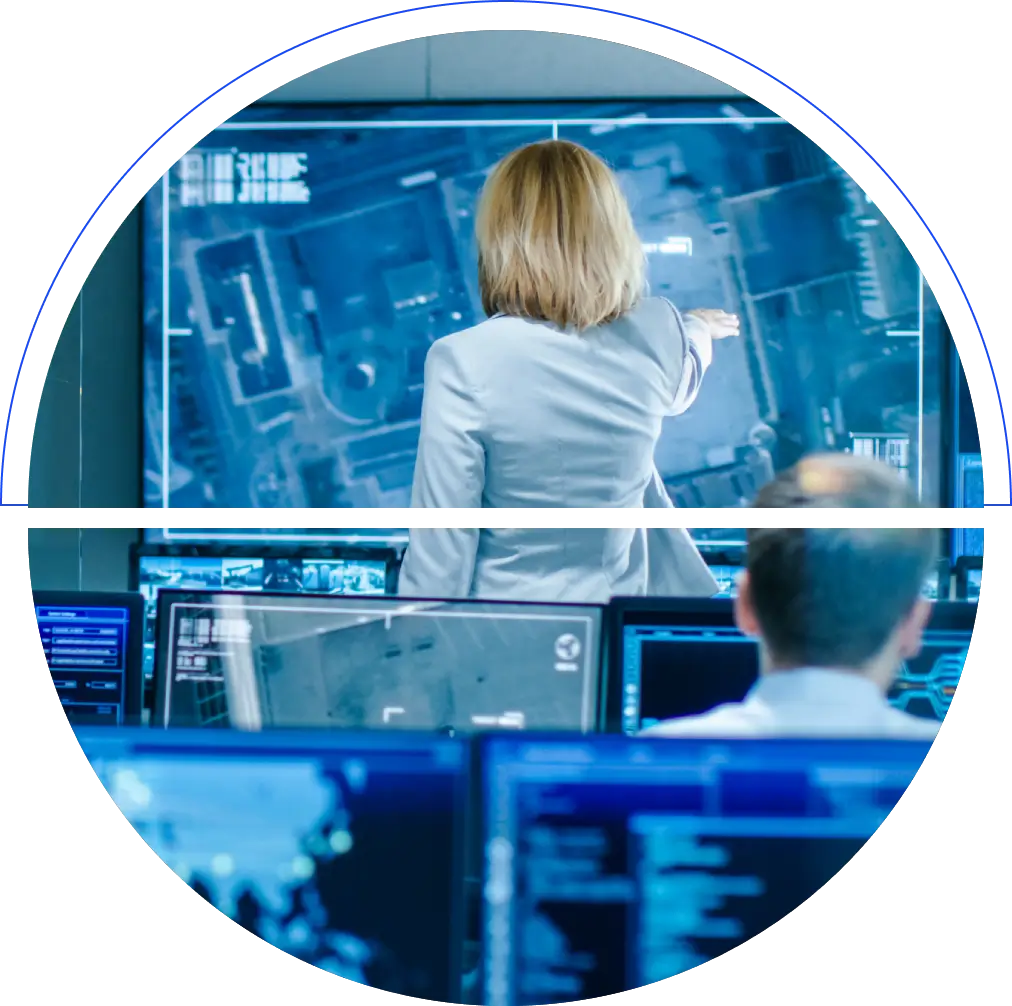 A woman standing in front of a monitor.